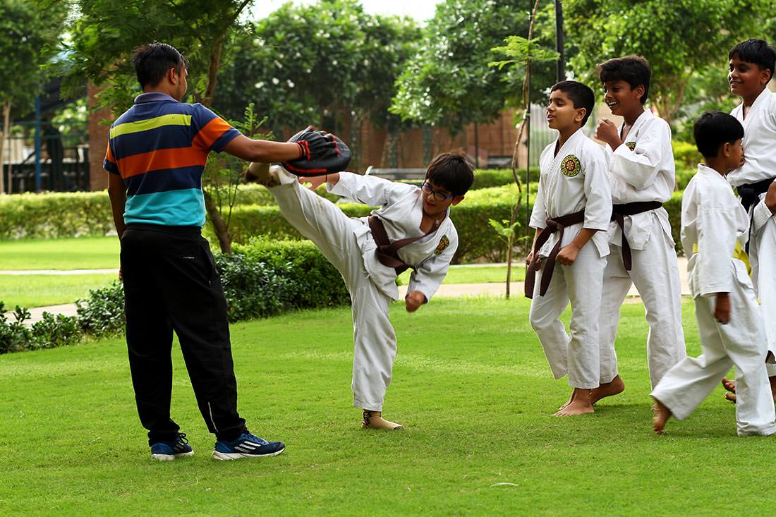 Kids Learning Karate in the Park